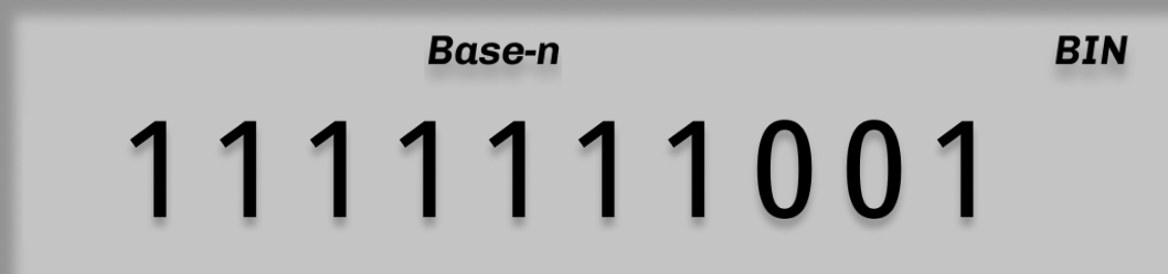 Display shows binary 1111111001 (5 XNOR 3, 10-bit two's complement)